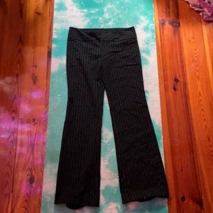 size small black pants with white stripes.